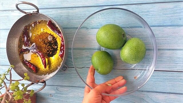 Aaam ka achar recipe or kachhe aam ka achar recipe with ingredients and step by step photoes