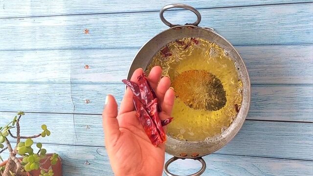 Aaam ka achar recipe or kachhe aam ka achar recipe with ingredients and step by step photoes