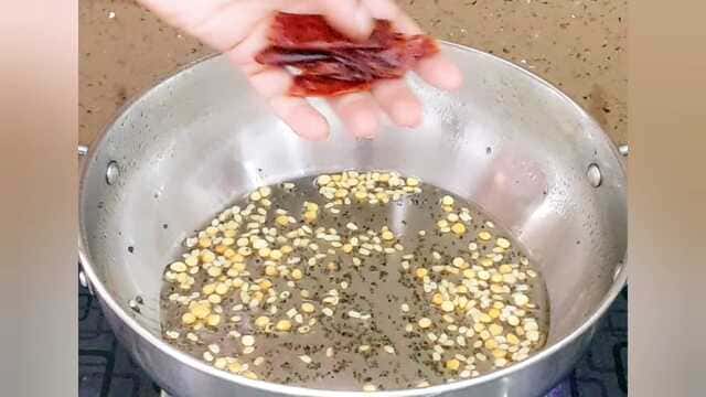 Crispy masala dosa stuffed with spiced potato masala, served with coconut chutney, red chatni and sambar