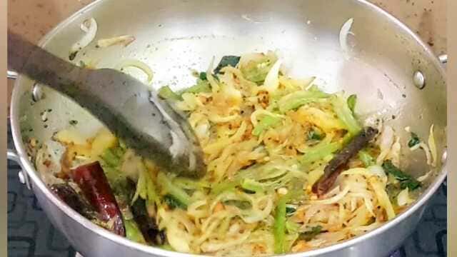 “South Indian masala dosa on a plate with sambar and chutney”