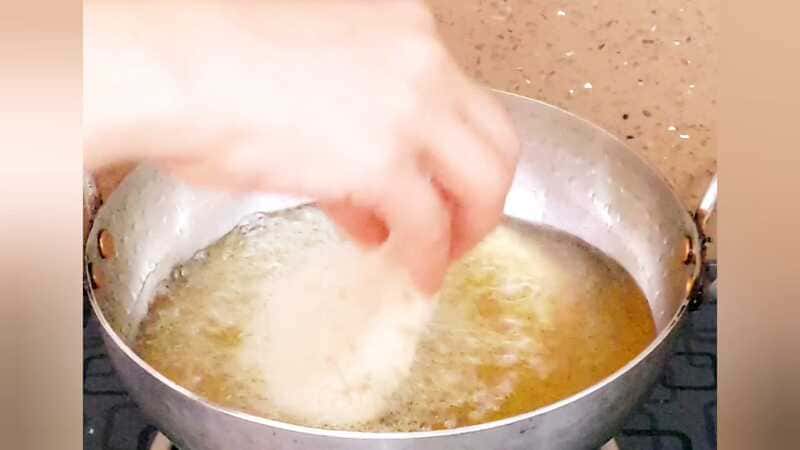 Homemade aloo tikki burger with golden potato patty