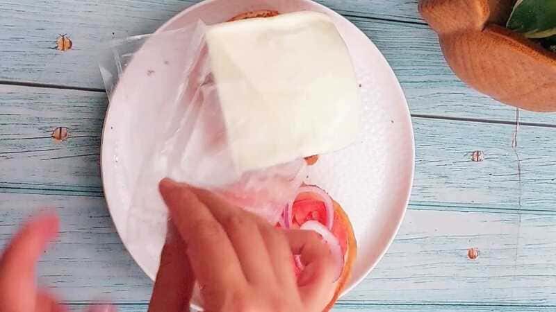 McDonald’s style aloo tikki burger with lettuce and cheese slice